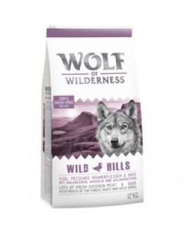 Blandat dubbelpack: 2 x 12 kg Wolf of Wilderness hundmat - Junior Wild Hills + Junior Green Fields